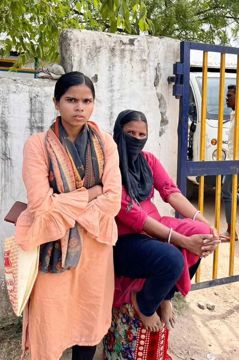 Heena and Seema outside a gas agency in Kanavani Heena and Seema outside a gas agency in Kanavani