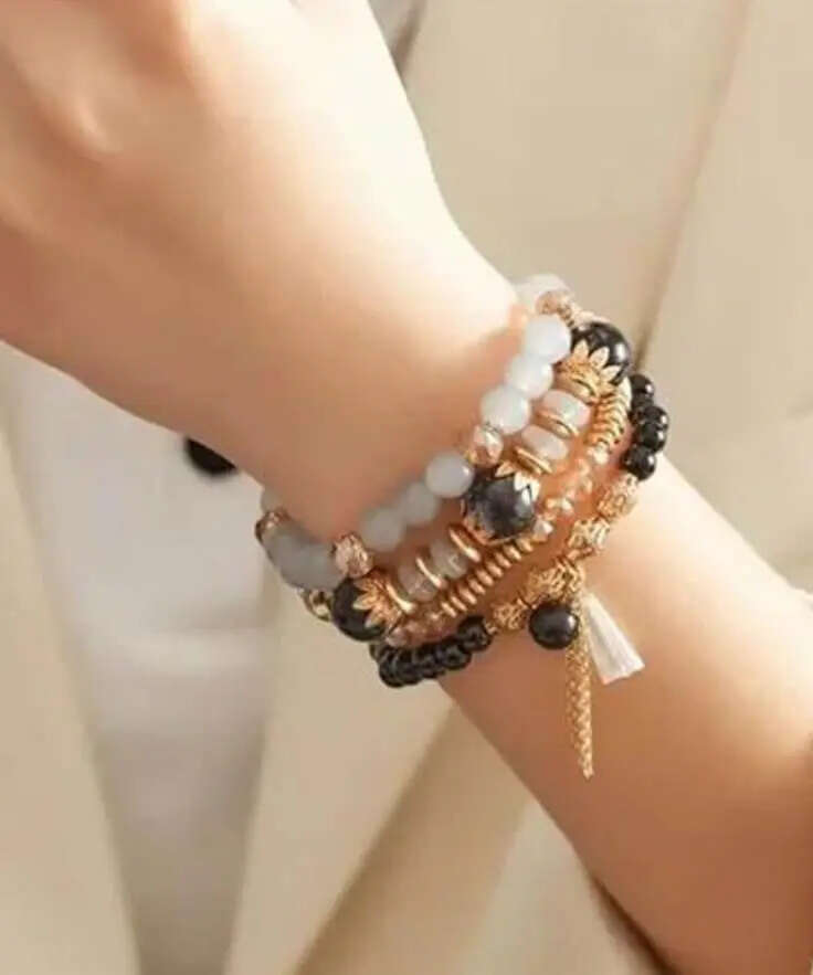 ​The best bracelet stacks are personal, incorporating sentimental pieces that tell your unique story