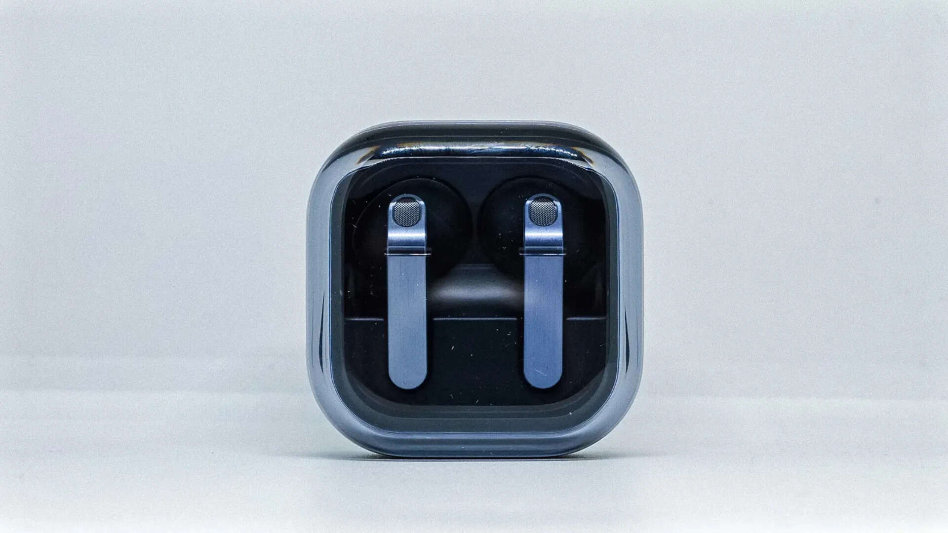 Both buds lie flat in the case—a change from the Buds 3 Pro