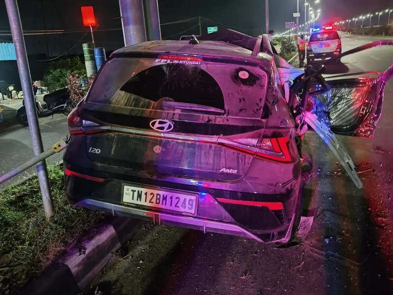 Rear-ended car crashes into pole; man dies, son unhurt