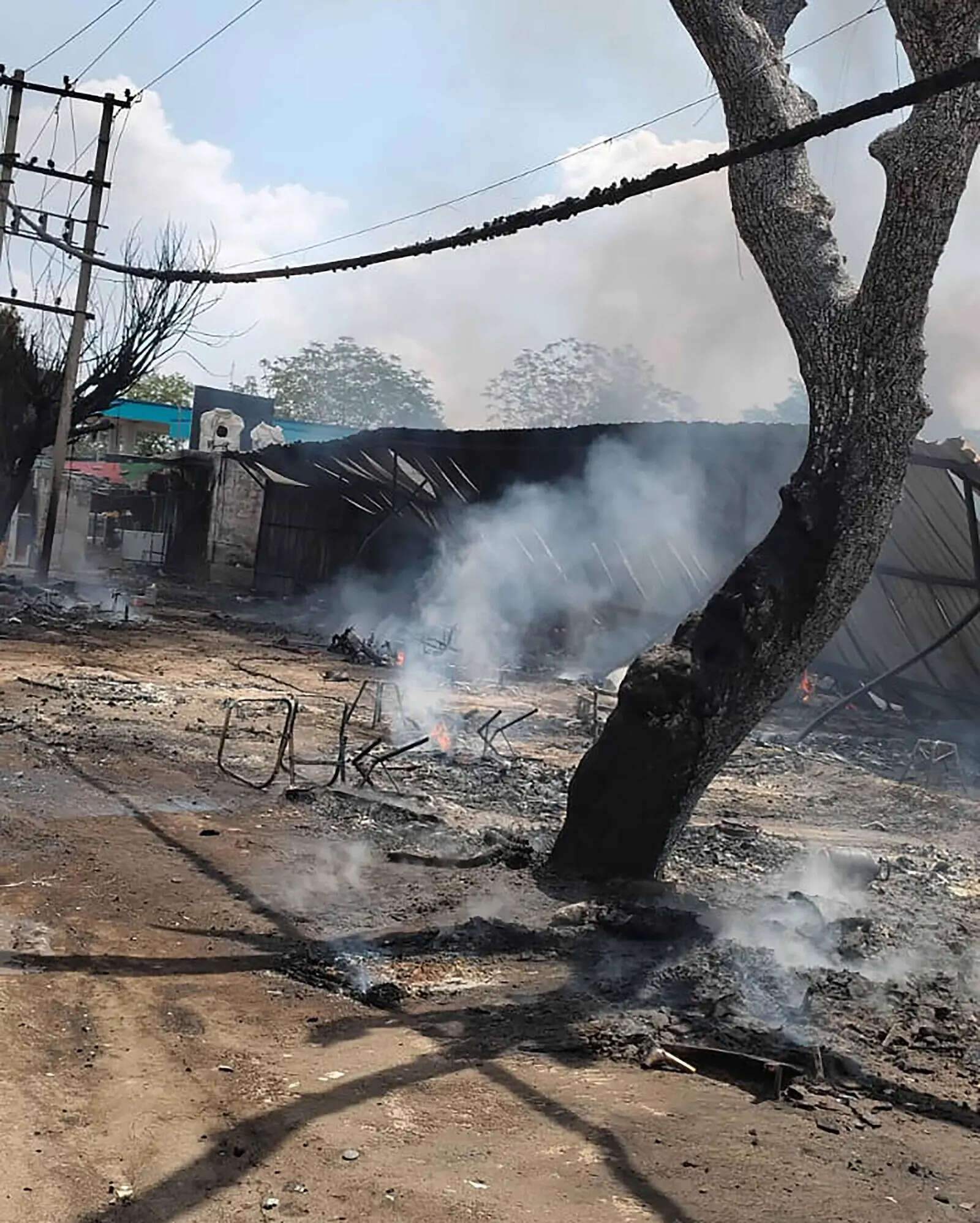 The flames spread rapidly due to the presence of wooden furniture and other flammable items stored in the units