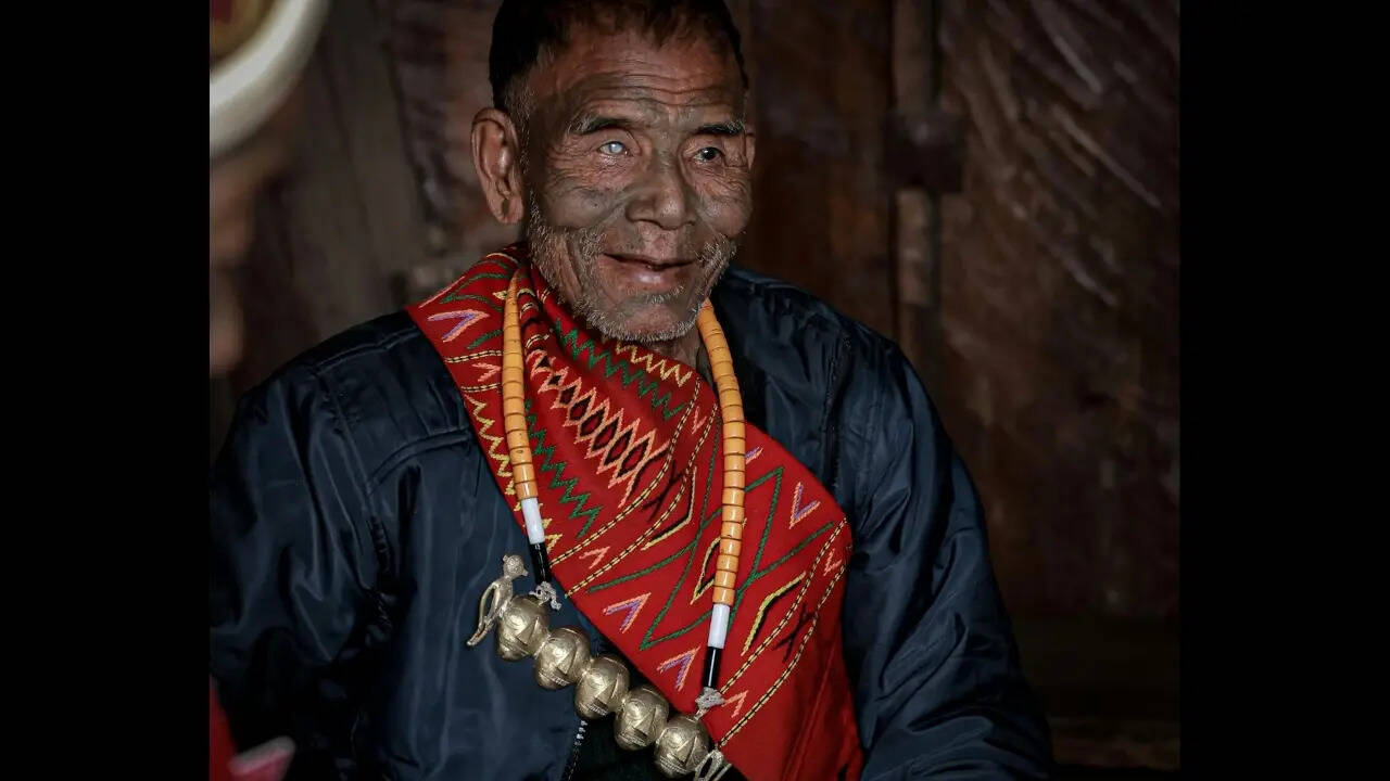 A Konyak elderly man with face tattoos