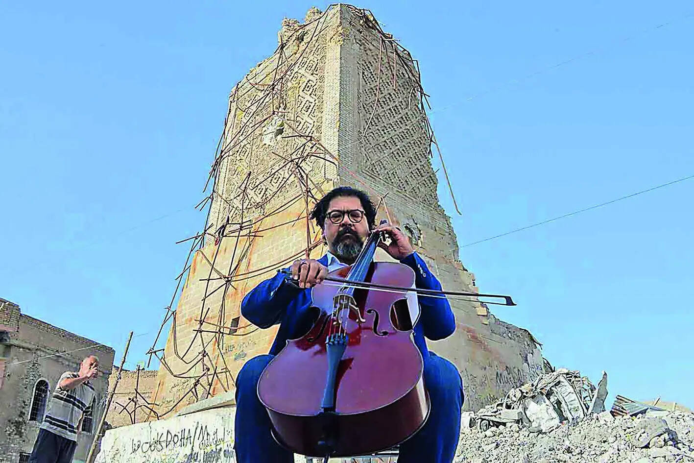 P4_SS_Iraqi maestro and cello player Karim Wasfi_Great Mosque of al-Nuri in Mosuls war-ravaged Old C