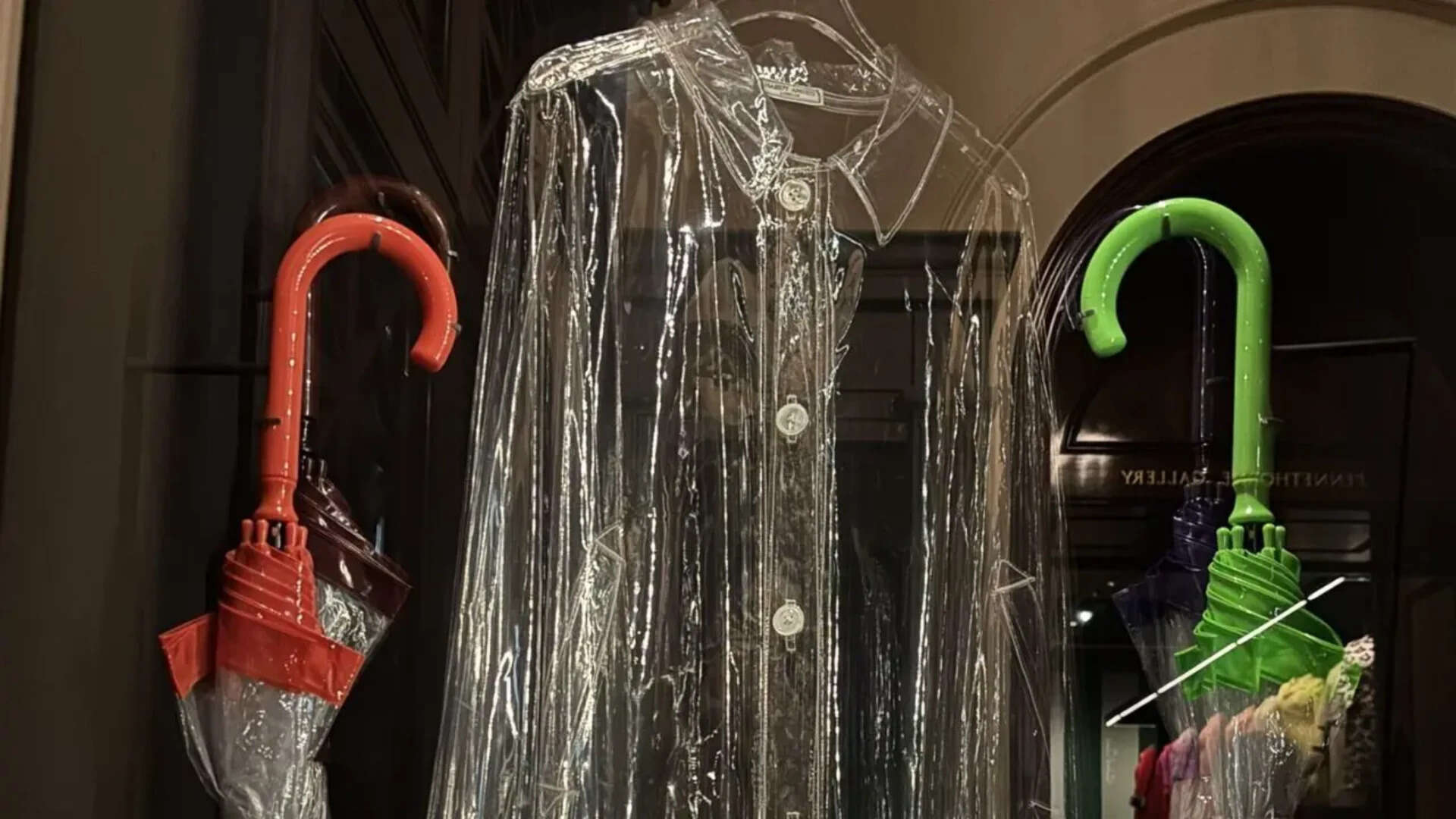 The transparent coat allowed people to still see her outfits in all weathers. <br>