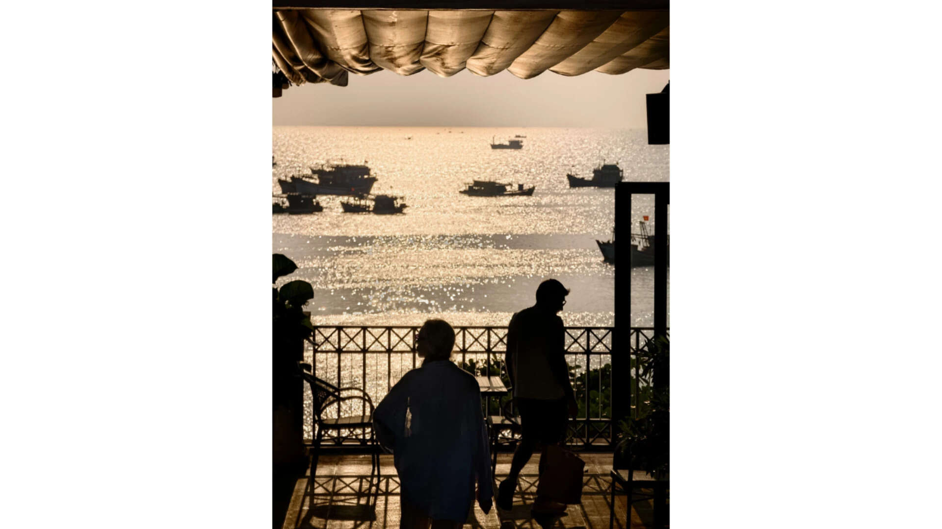 Silhouettes against water