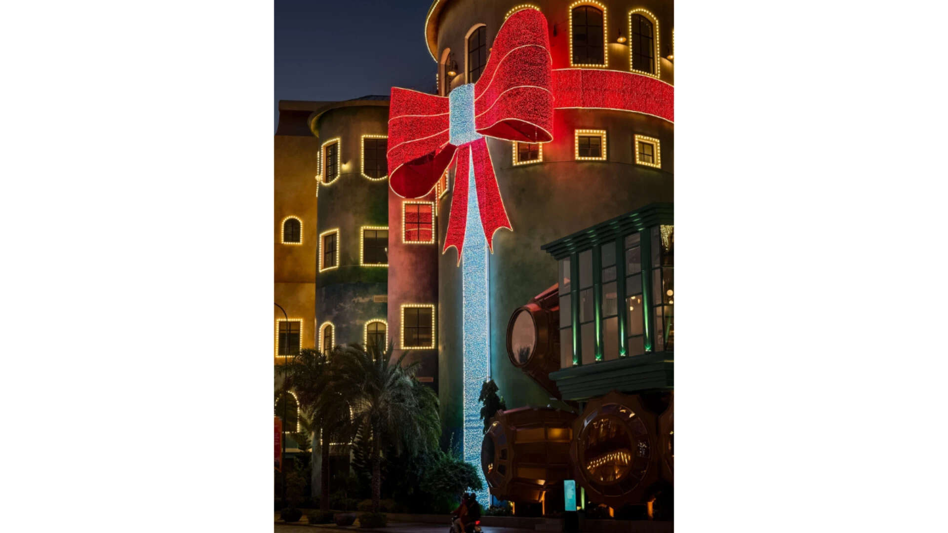 Red bow building at night