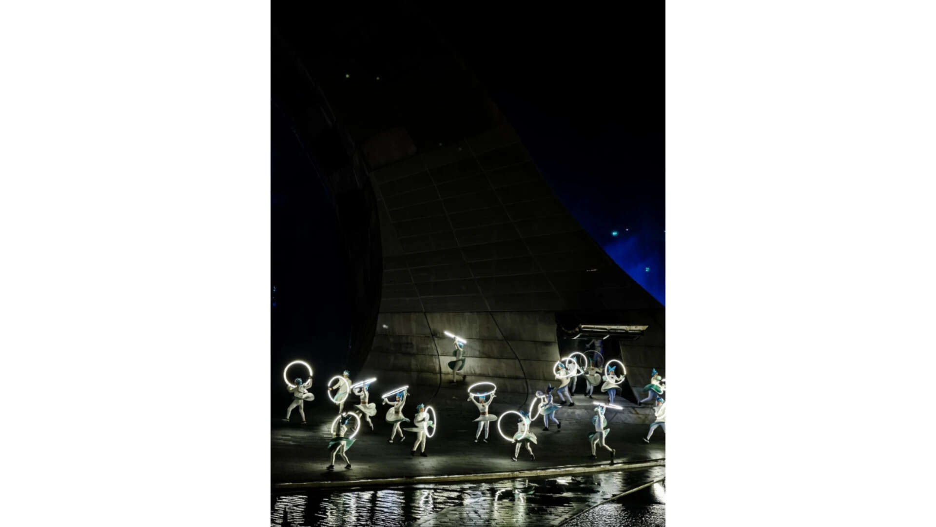 Dancers with light rings