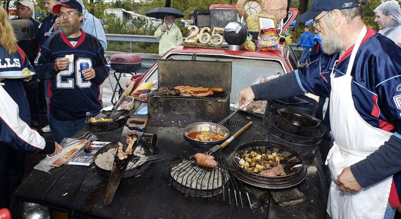 Tailgating involves pre-match gatherings in stadium parking lots with grills, food, drinks and fan rituals.