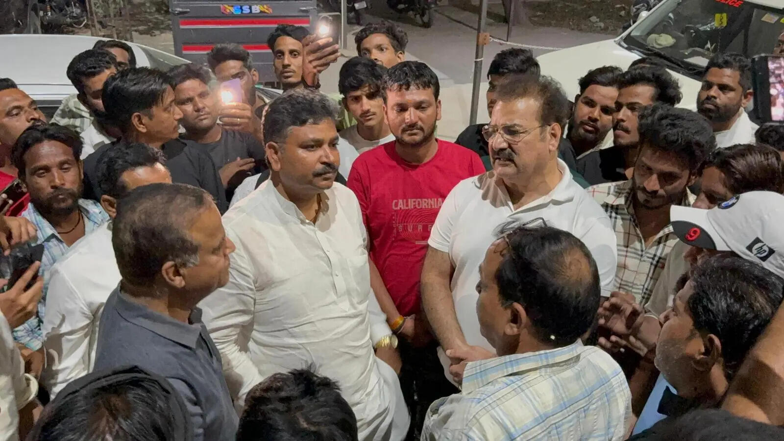 Tikaram Jully and Pratap Singh Khachariyawas meet sanitation workers at Kanwatia hospital in Jaipur
