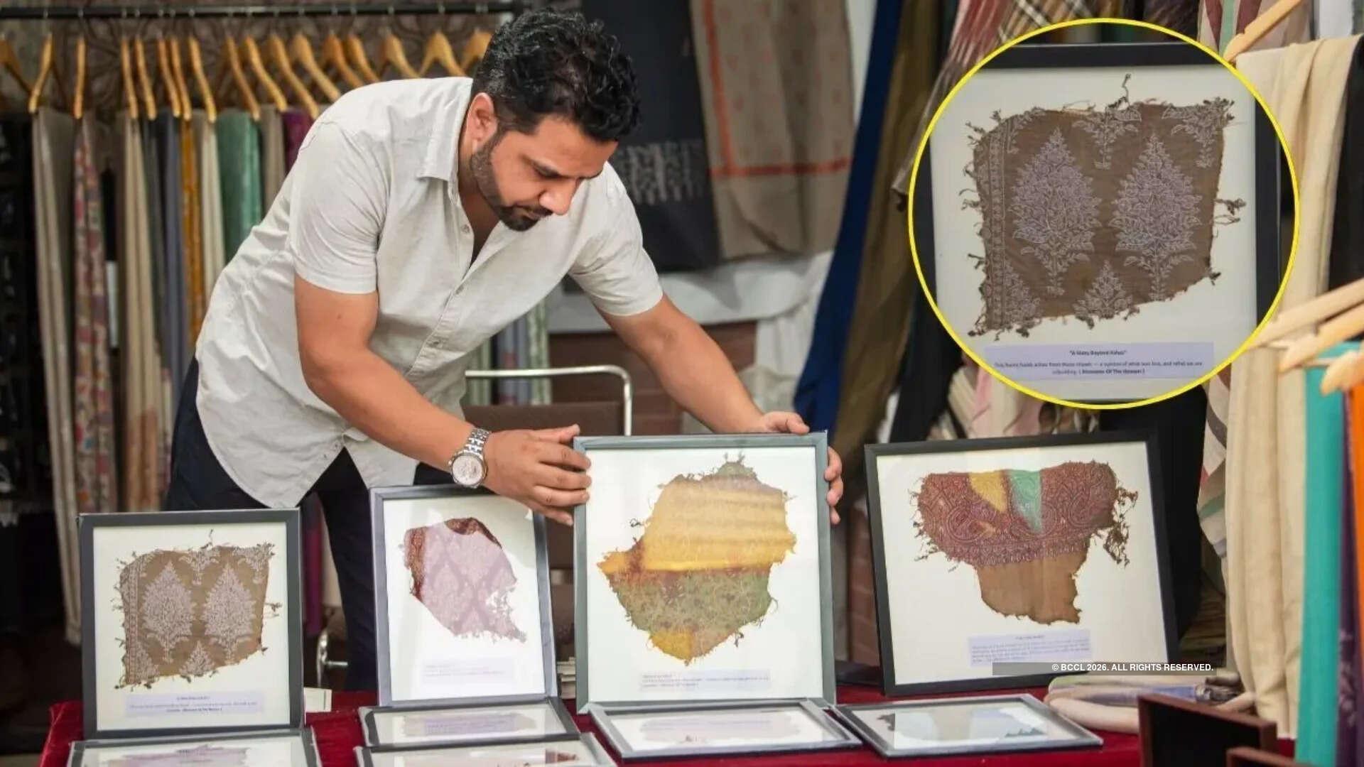 Manzoor Ahmad Khan displays the burnt scraps of pashmina shawls