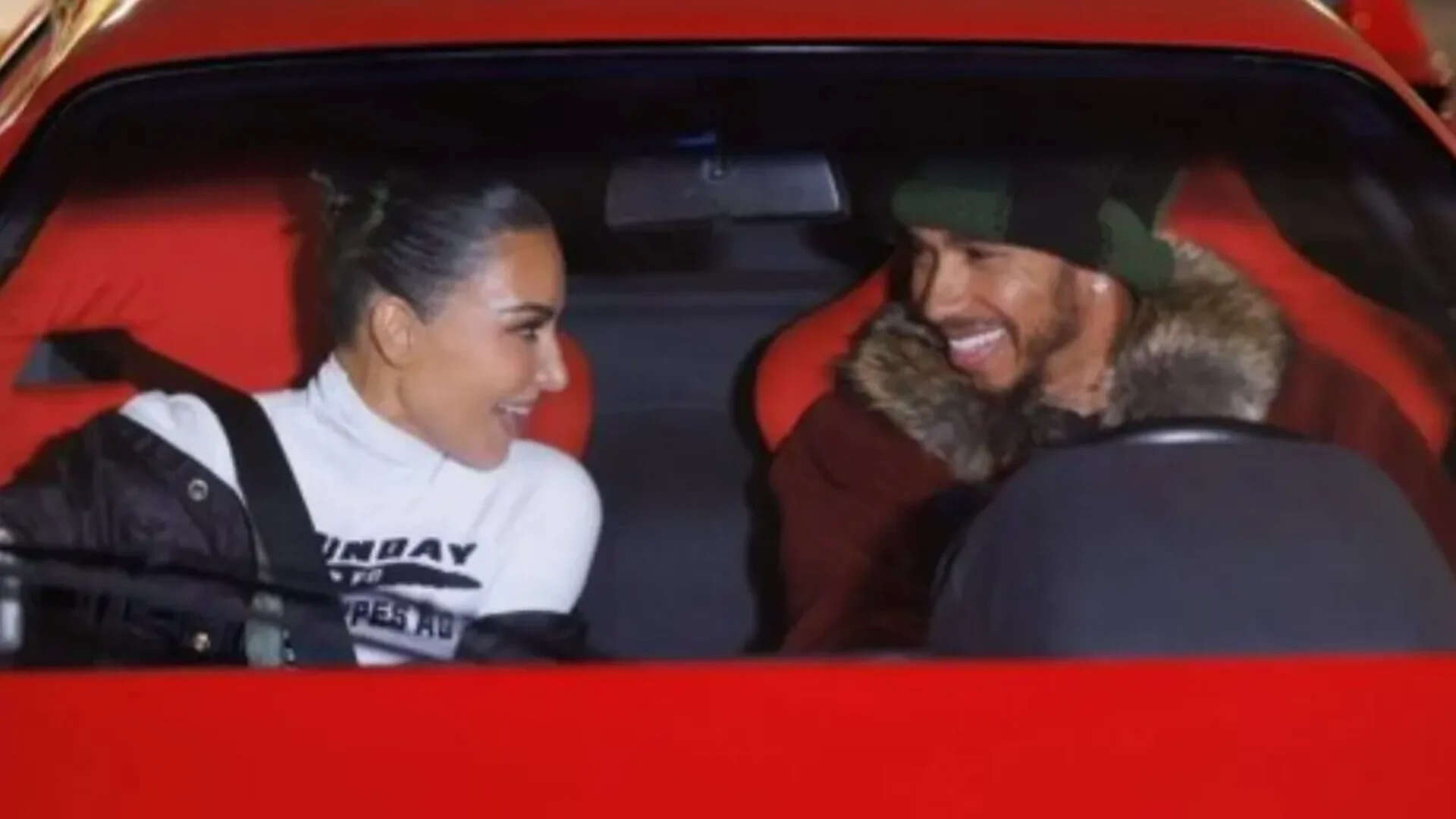 Lewis and Kim pack on the PDA on beach date - WATCH