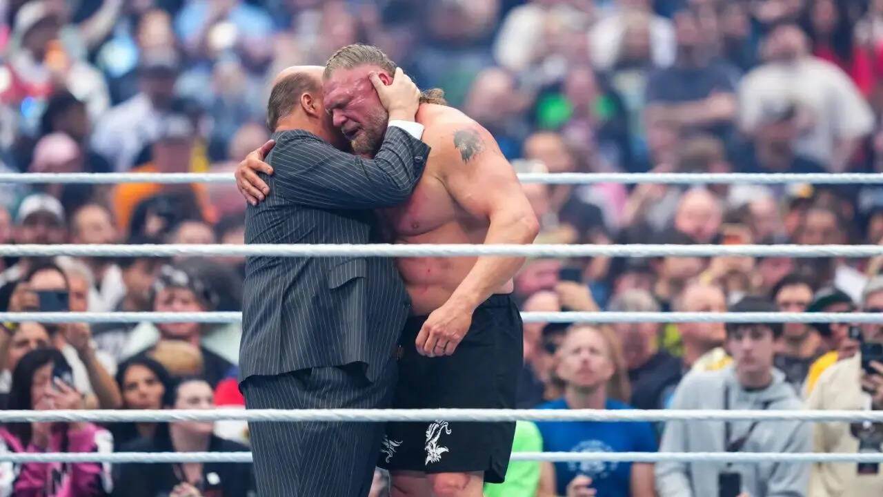 Paul Heyman and Brock Lesnar