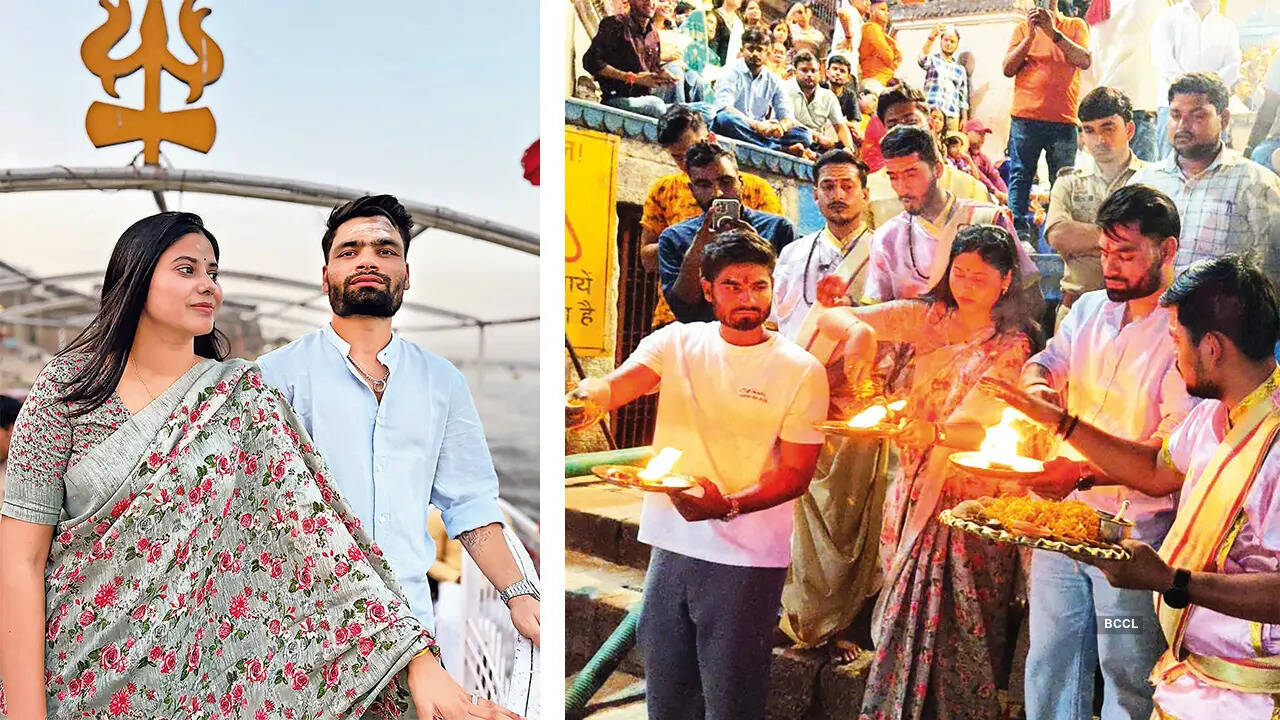 Rinku Singh and Priya Saroj (L) enjoying a boat ride in the Ganga