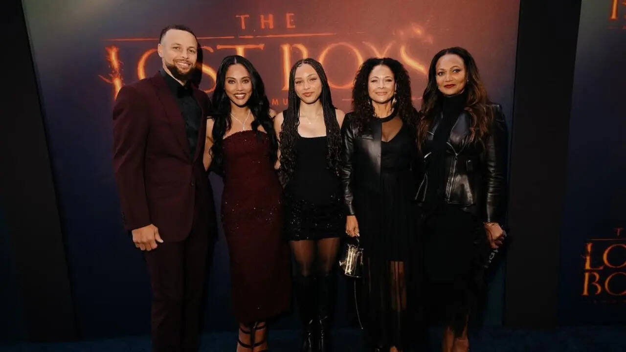 Stephen Curry and Ayesha Curry with family and friends