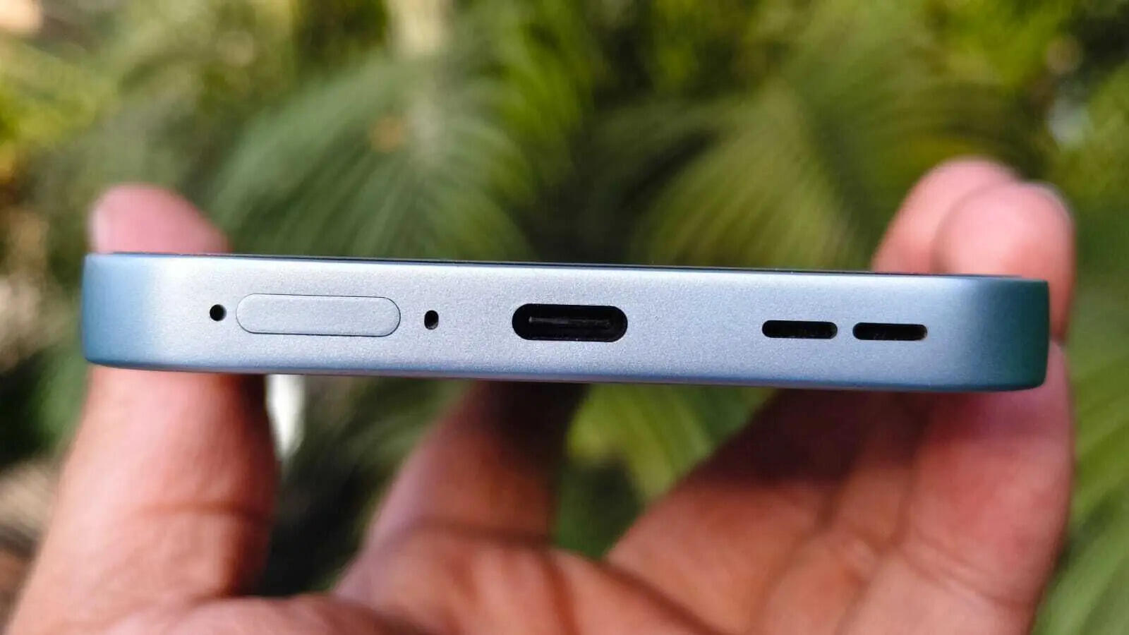 USB Type-C charging port, speaker grille and SIM tray