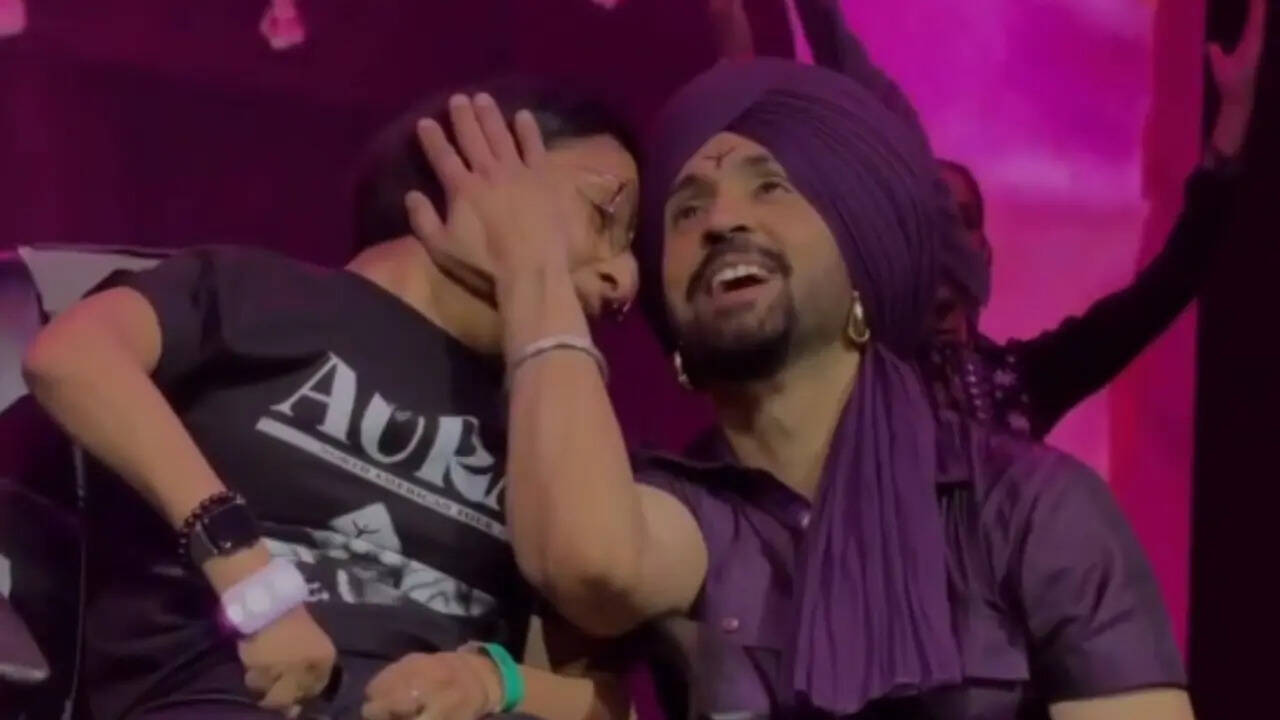Diljit's heartwarming moment with a fan wins the internet as he sings 'Hass Hass' live for her