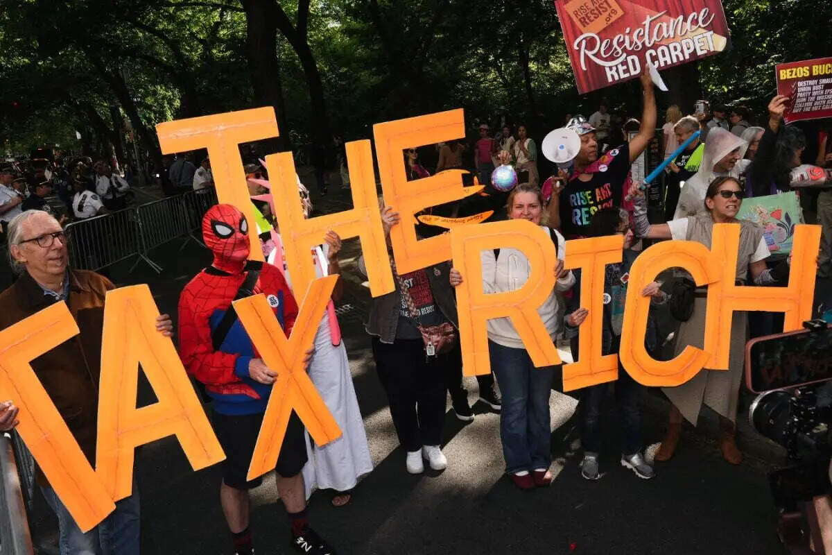 ‘Tax The Rich’ Protests Erupt Outside Jeff Bezos-Backed Met Gala 2026