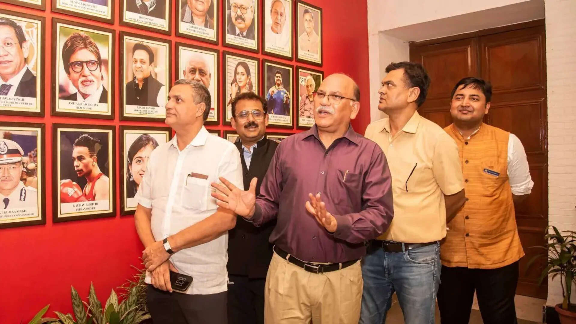 Dinesh Khattar (centre) with alumni at the Wall of Fame