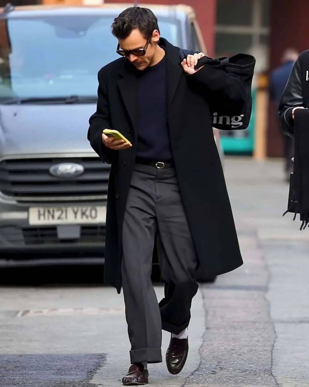 Harry Styles, with sock
