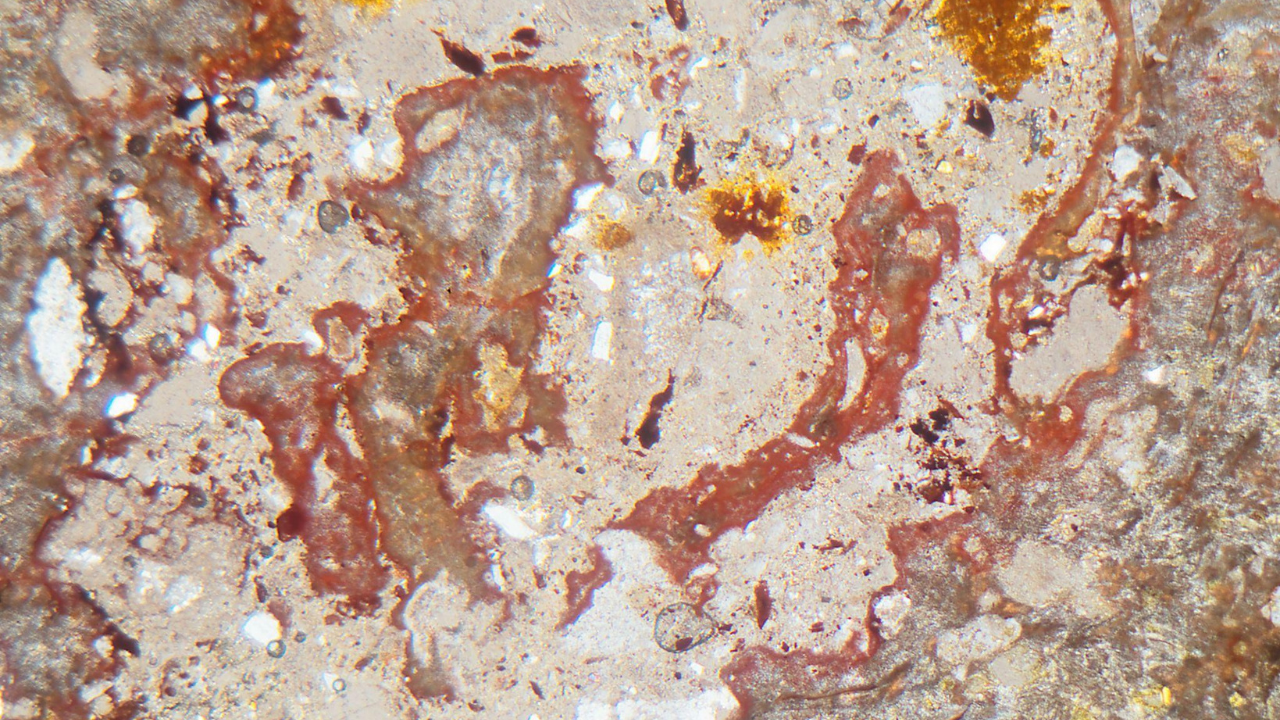Microscopic view of suevite rock from the Ries crater near Nordlingen, formed during a giant asteroid impact around 15 million years ago.