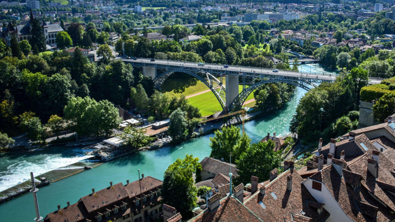 Switzerland’s summer hack: People swim through a river to get home from work
