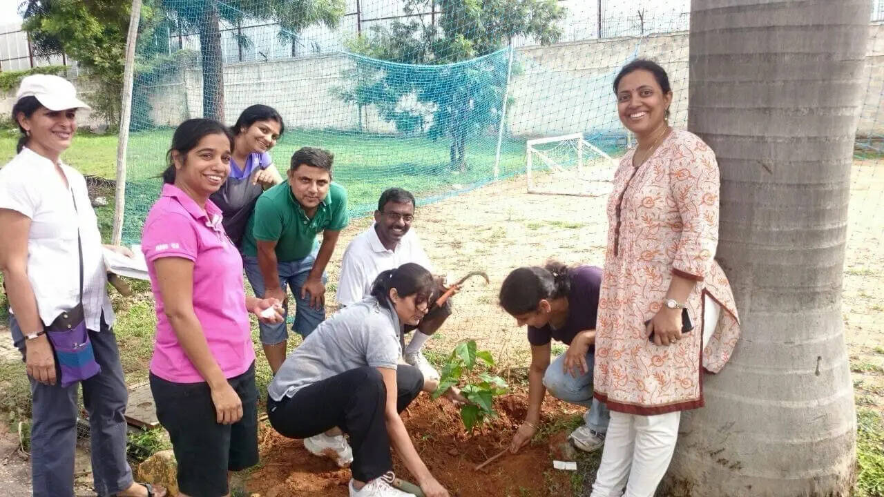 Lead- holding pic.1 Ferns Paradise Tree planting intiative