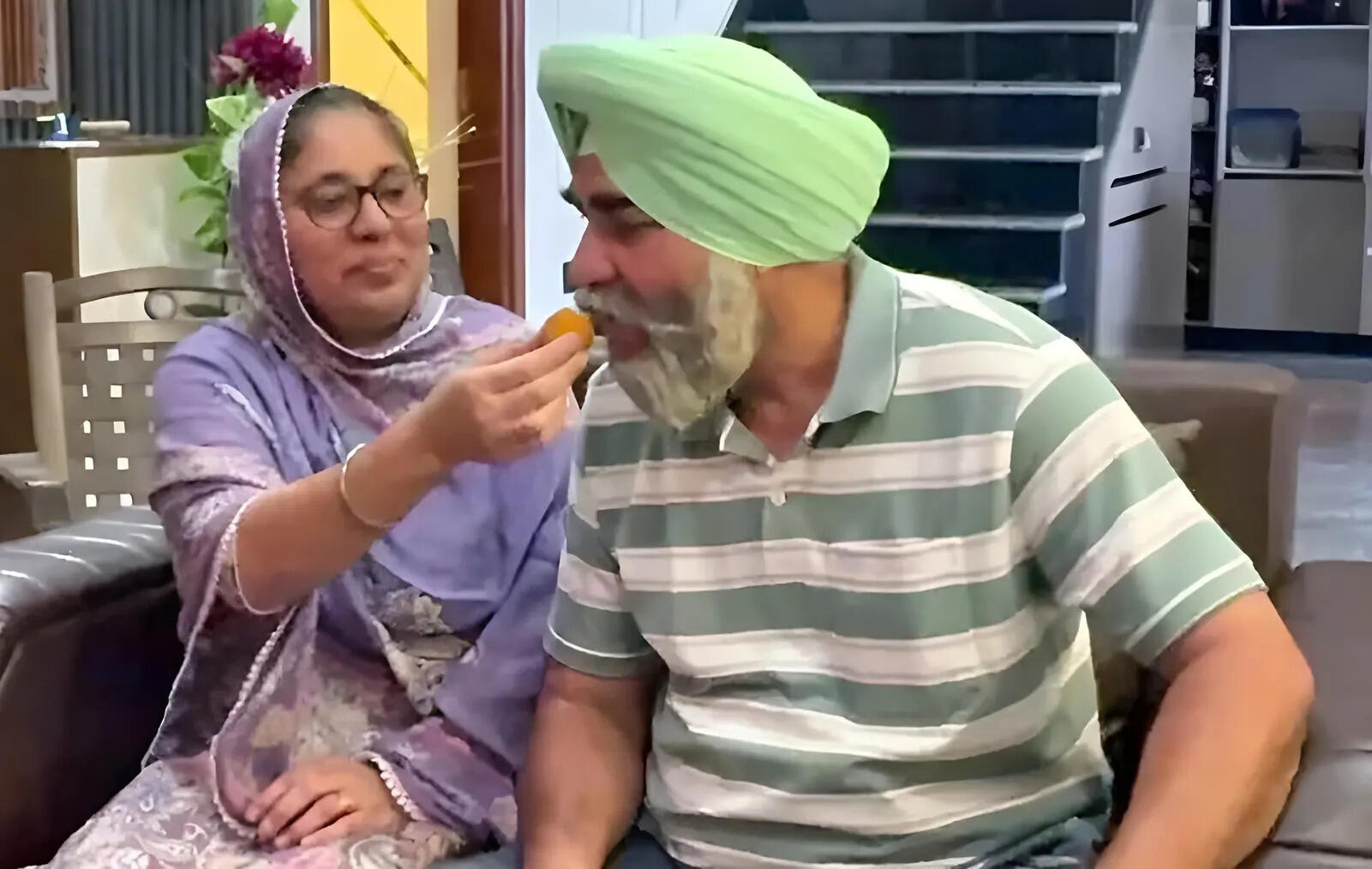 Gurindervir Singh's parents celebrating