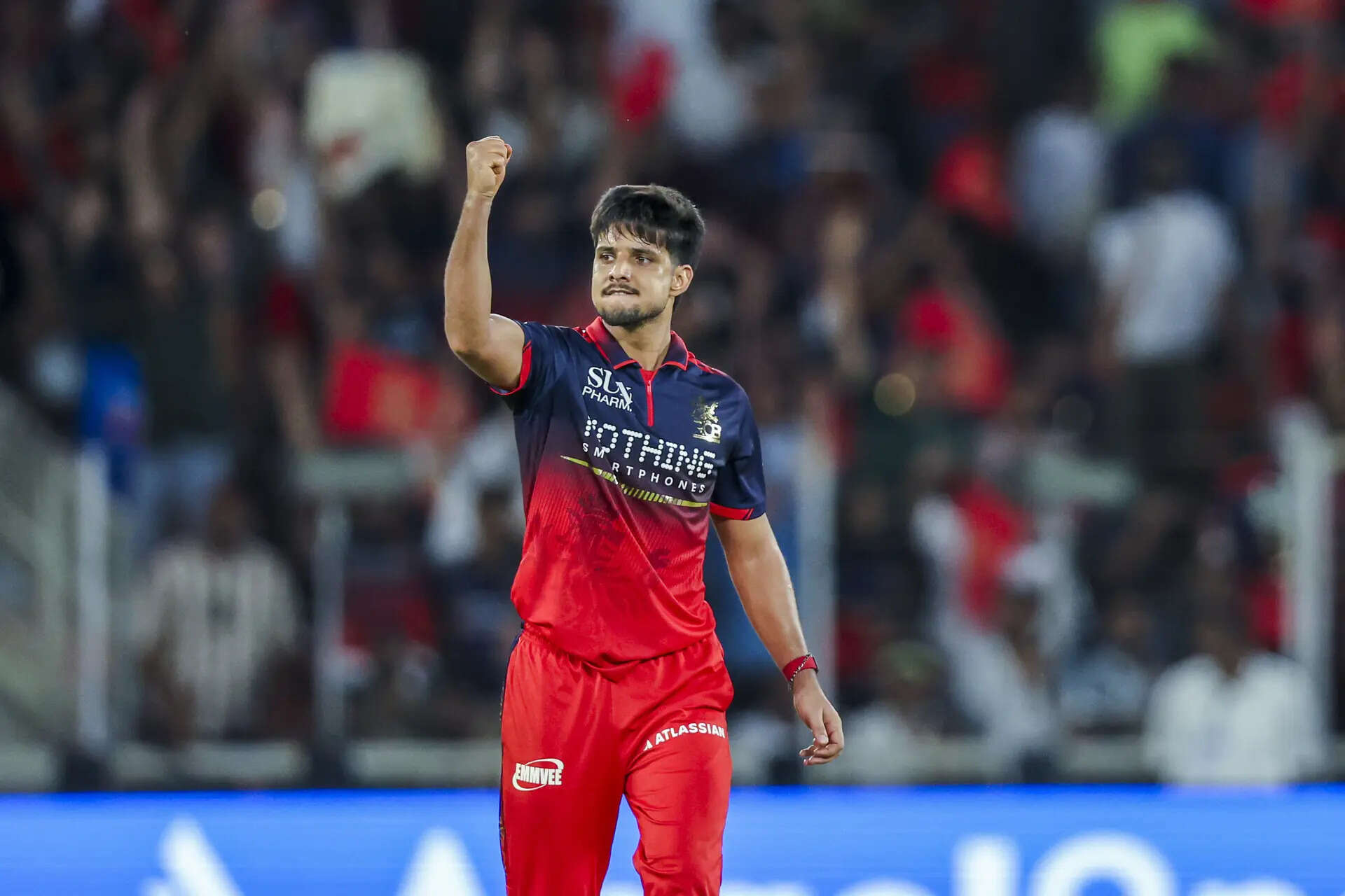 Ahmedabad, May 31 (ANI): Royal Challengers Bengaluru's Rasikh Salam Dar celebrat...