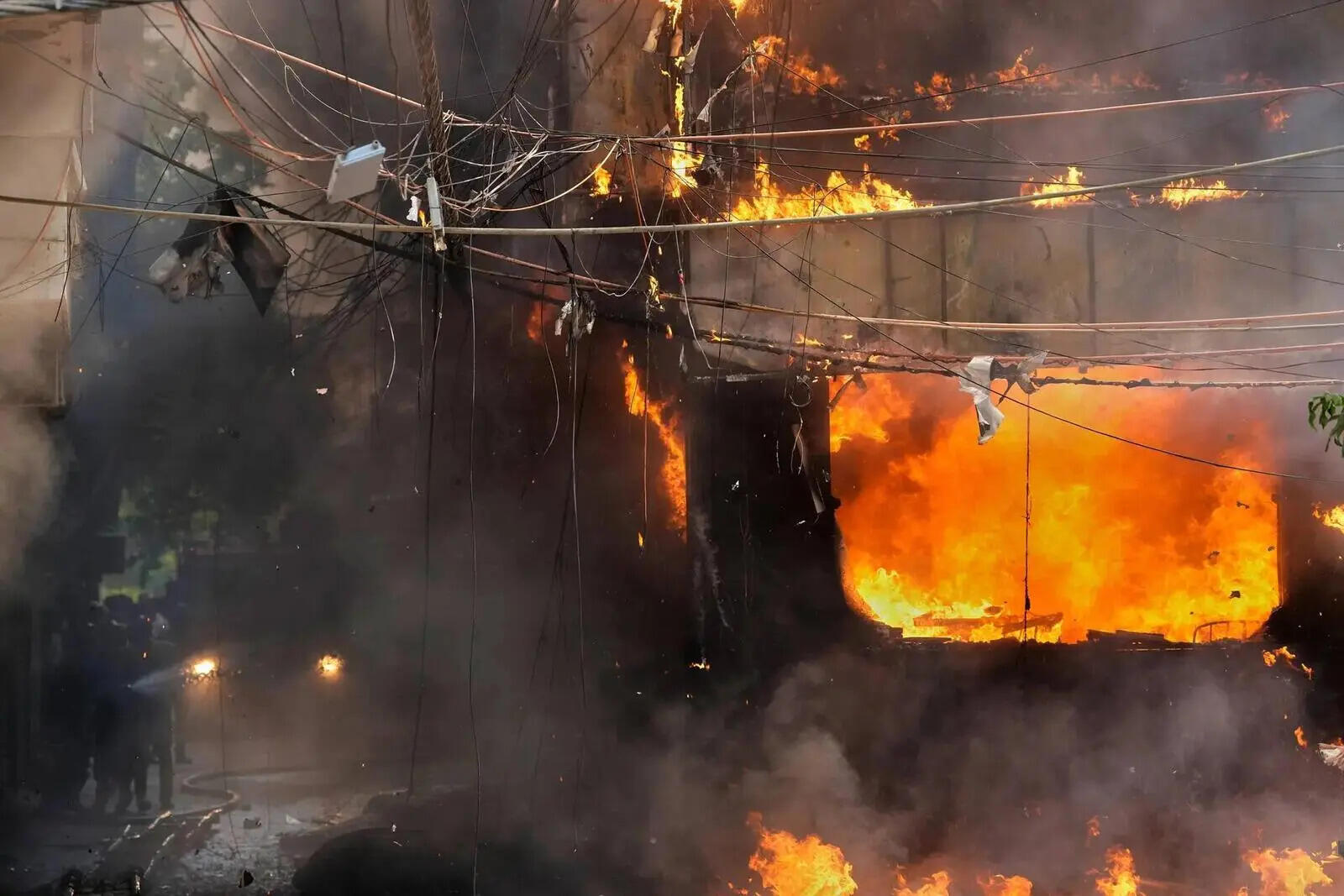 Photos show a rescue operation in a New Delhi hotel fire.