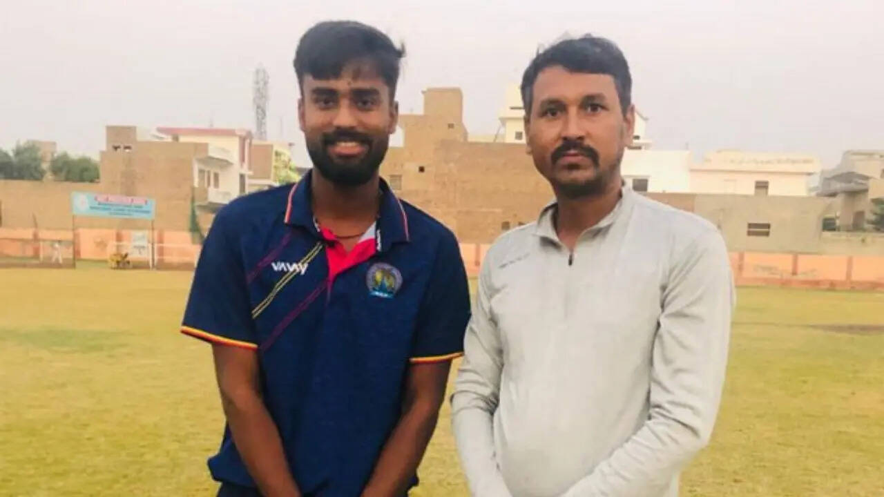 Manav Suthar with coach Dheeraj Sharma (Special Arrangements) Manav Suthar with coach Dheeraj Sharma (Special Arrangements)