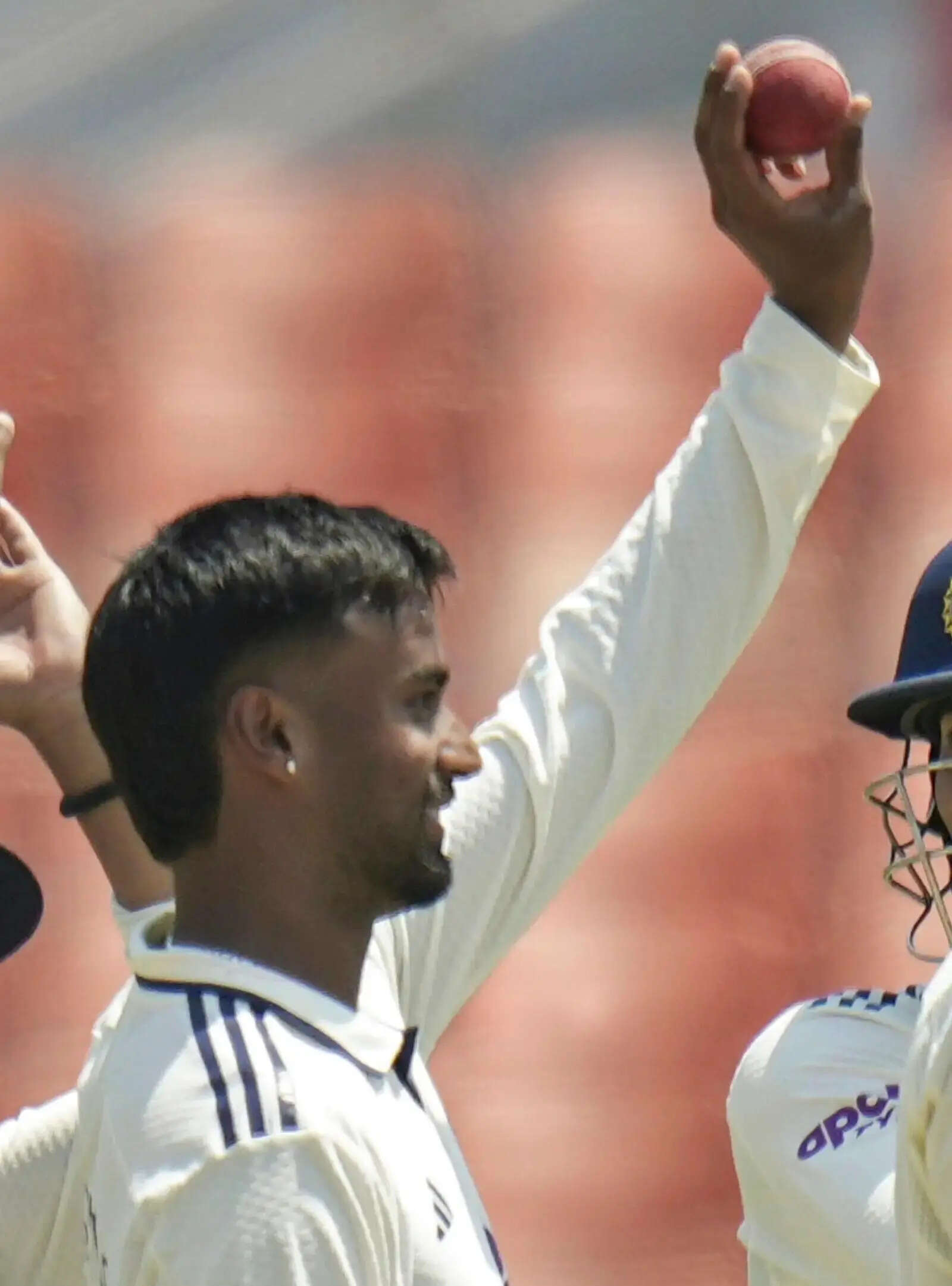 Manav Suthar holds the ball up after taking his fifth wicket of the innings on day three of the cricket test match between Afghanistan and India in New Chandigarh, India, Monday, June 8, 2026. (AP Photo)