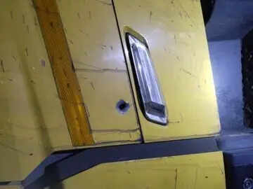 09b49ca5-6ac4-432f-bcc5-93dcf922fb5d_Bullet_mark_on_the_cabin_door_of_the_hyva_truvk.Vishvendu_Jaipuriar_.jpg