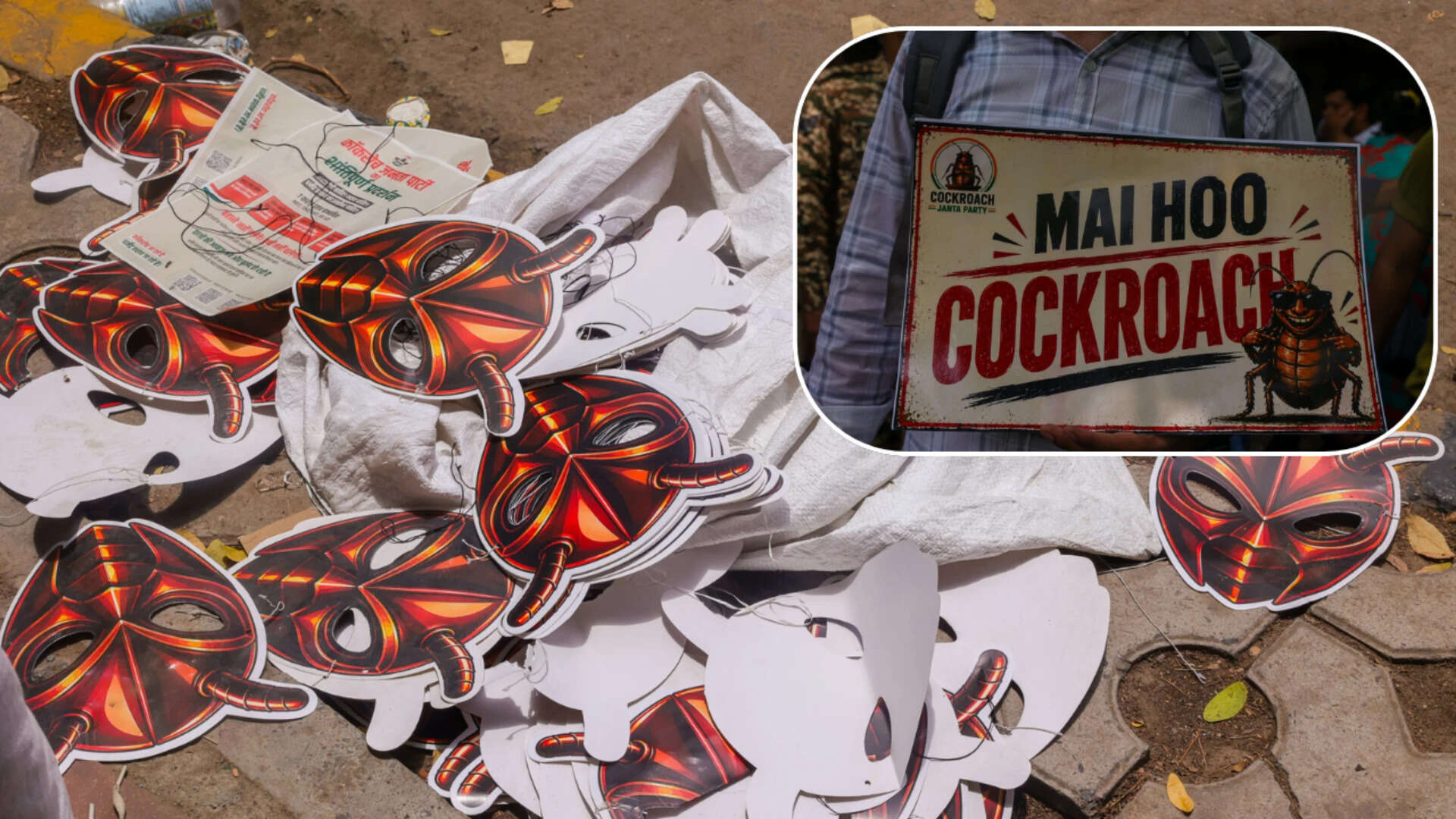 Cockroach masks and pamphlets lay scattered across the pavement as students moved through the gathering, handing out flowers