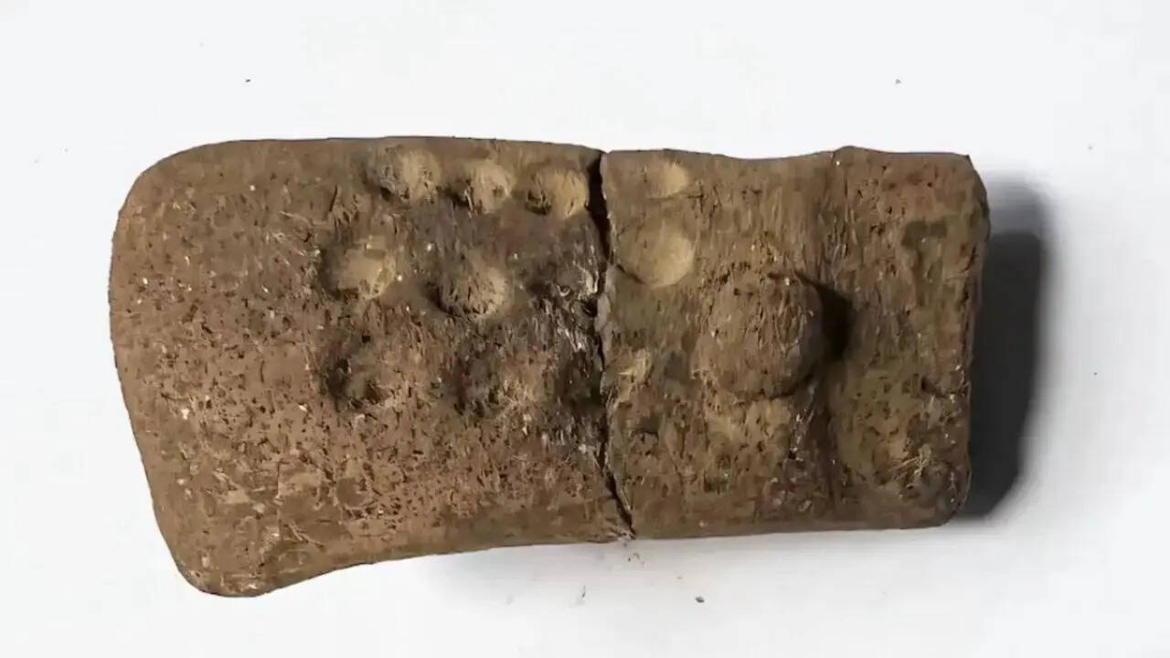 11 mysterious dots on a 2,700-year-old figurine are forcing archaeologists to rethink early writing in Guatemala
