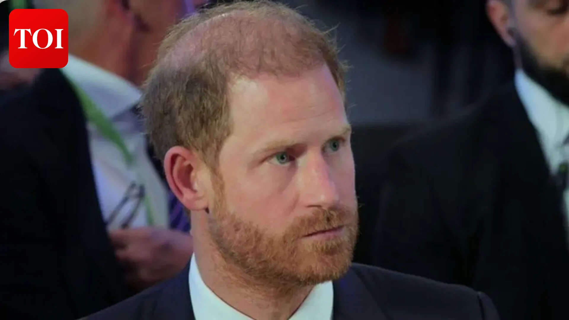 Prince Harry reacts as the royal family attends Trooping the Colour without him and Meghan Markle<br>