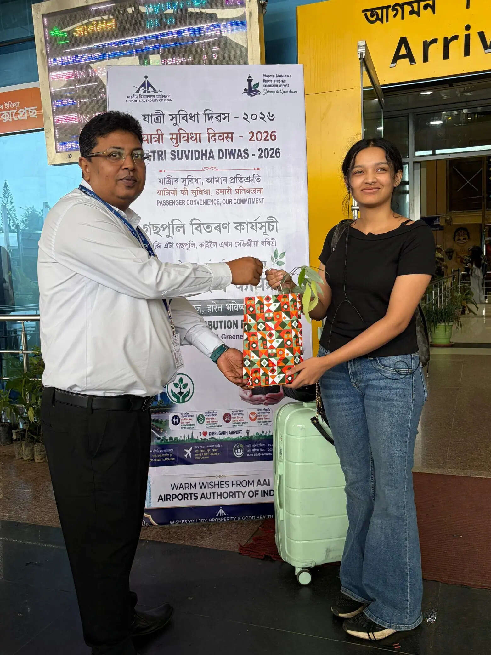 50fb696b-3cc2-4f50-852c-953e849537de_Passengers_greeted_with_saplings_Dibrugarh_Airport.jpg