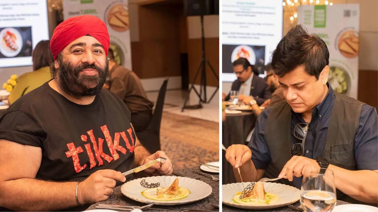 Gurpreet Singh Tikku and Chef Sabyasachi Gorai enjoying chicken roulade