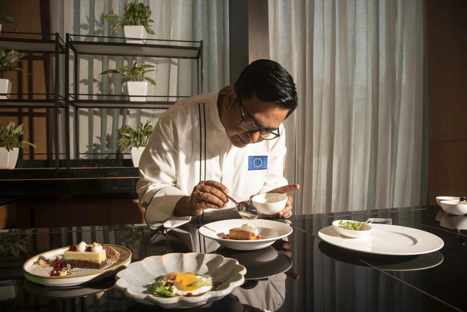 Pan-seared potato terrine with tomato salsa vierge by Chef Ajay Chopra