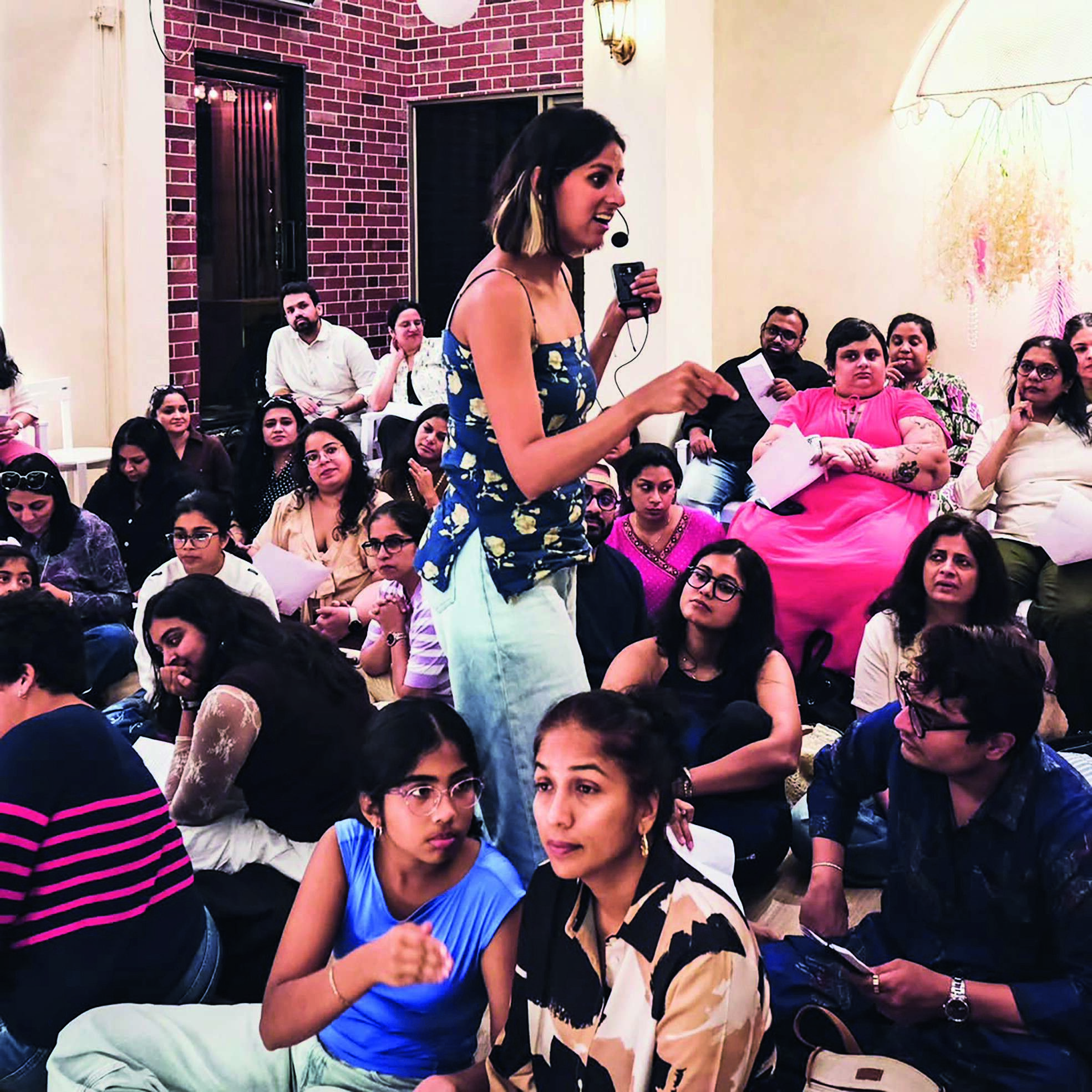 Medha Sahi in a session of The Strangers’ Choir, where strangers come together to learn one song as a part of a choir (Pic:@thestrangerschoir)