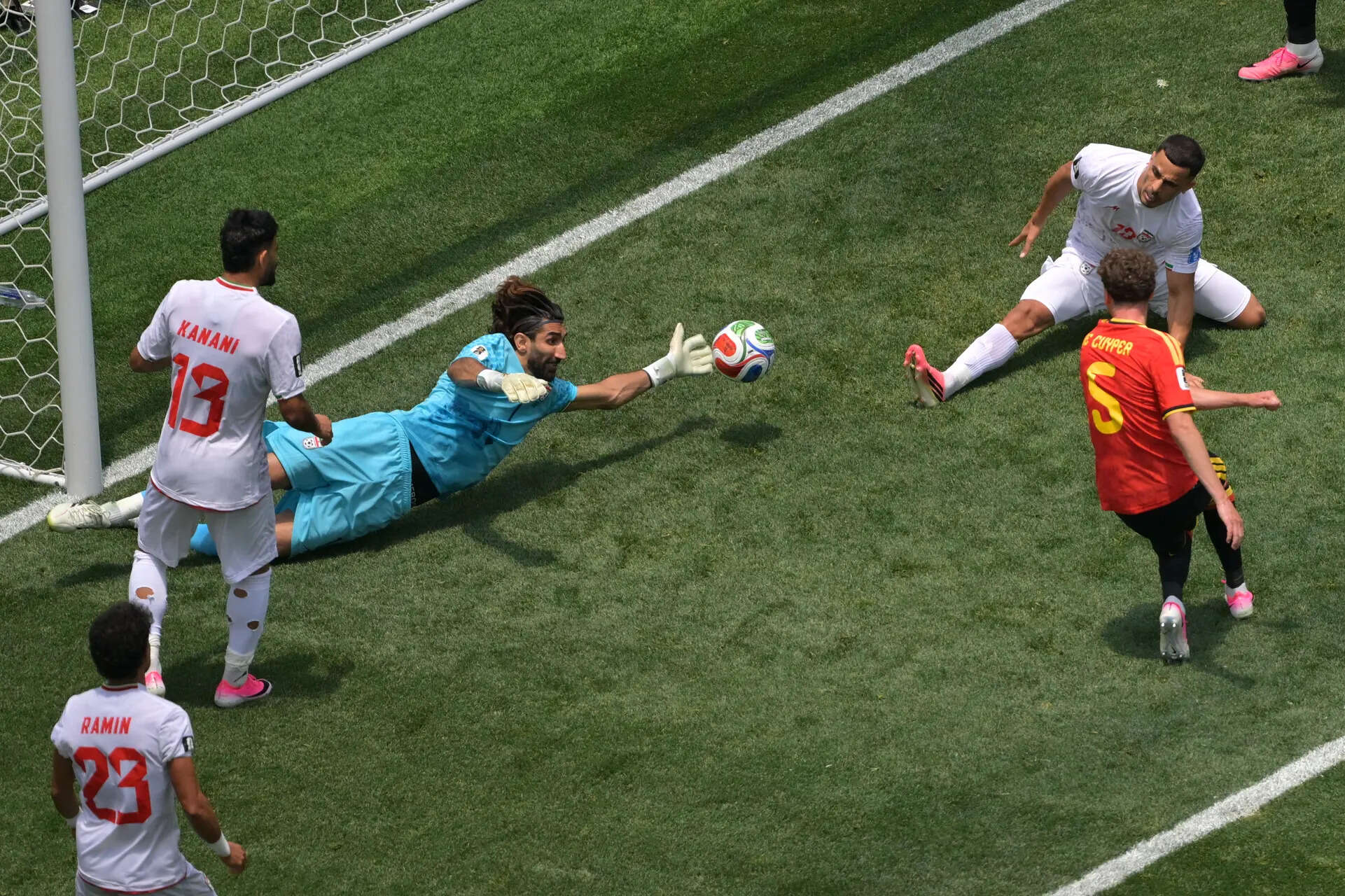 Iran goalkeeper Alireza Beiranvand (1) saves during the World Cup Group G soccer match between Belgium and Iran in Inglewood, Calif., near Los Angeles, Sunday, June 21, 2026. (AP Photo/Jayne Kamin-Oncea) Iran Belgium WCup Soccer