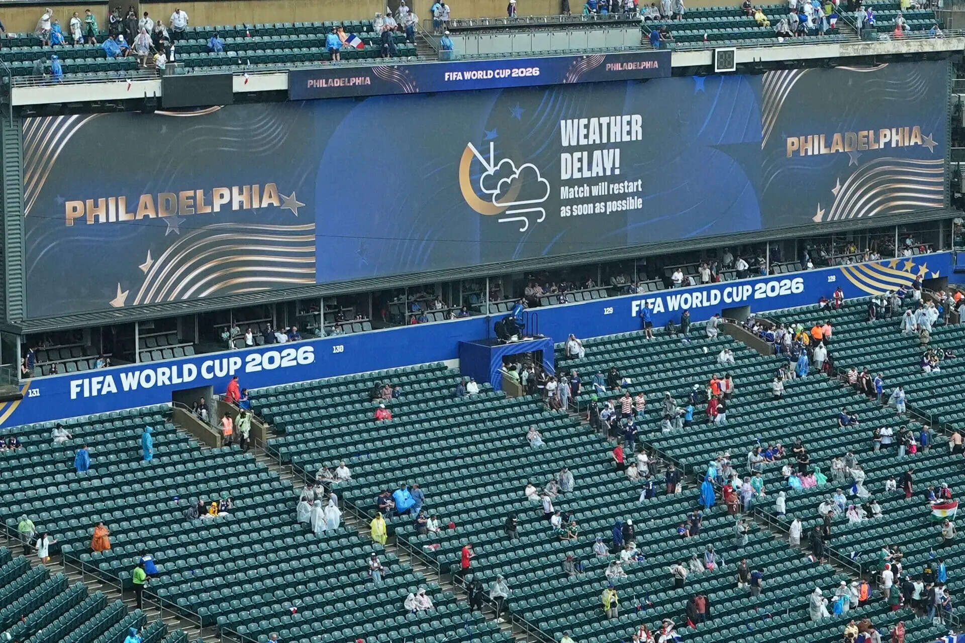 A sign advising fans of a weather delay is displayed during the World Cup Group I soccer match between France and Iraq in Philadelphia, Monday, June 22, 2026. (AP Photo/Matt Rourke) World Cup sees first weather delay as fans cleared from seats at France-Iraq match in Philadelphia
