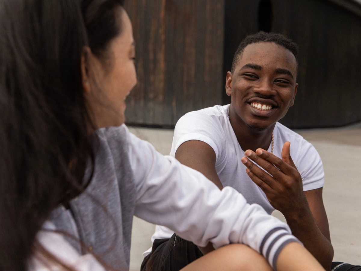 Positive interactions, reassurance, and supportive relationships can help reduce the sense of threat attached to uncertain social situations | Pexels