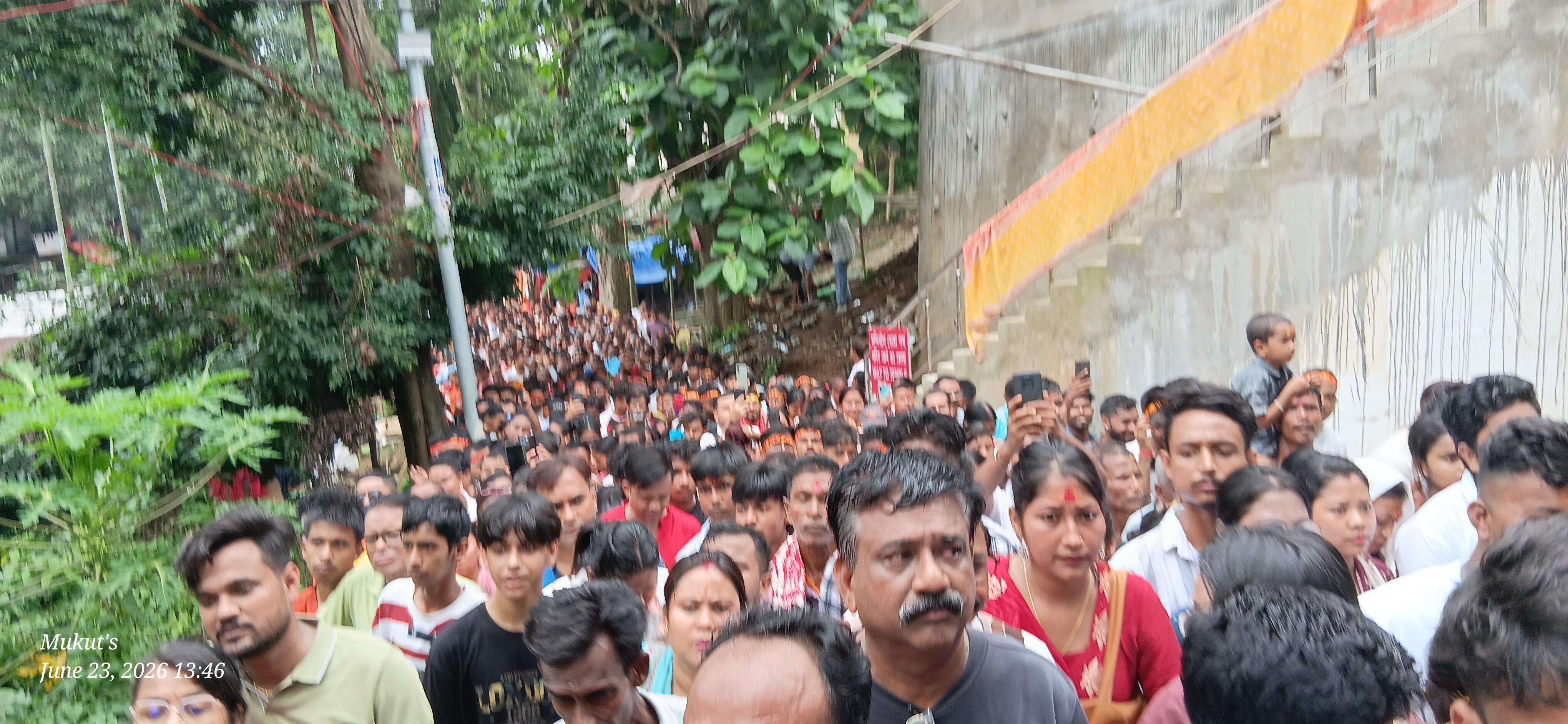 Devotees marching towards  the temple on barefoot.jpg