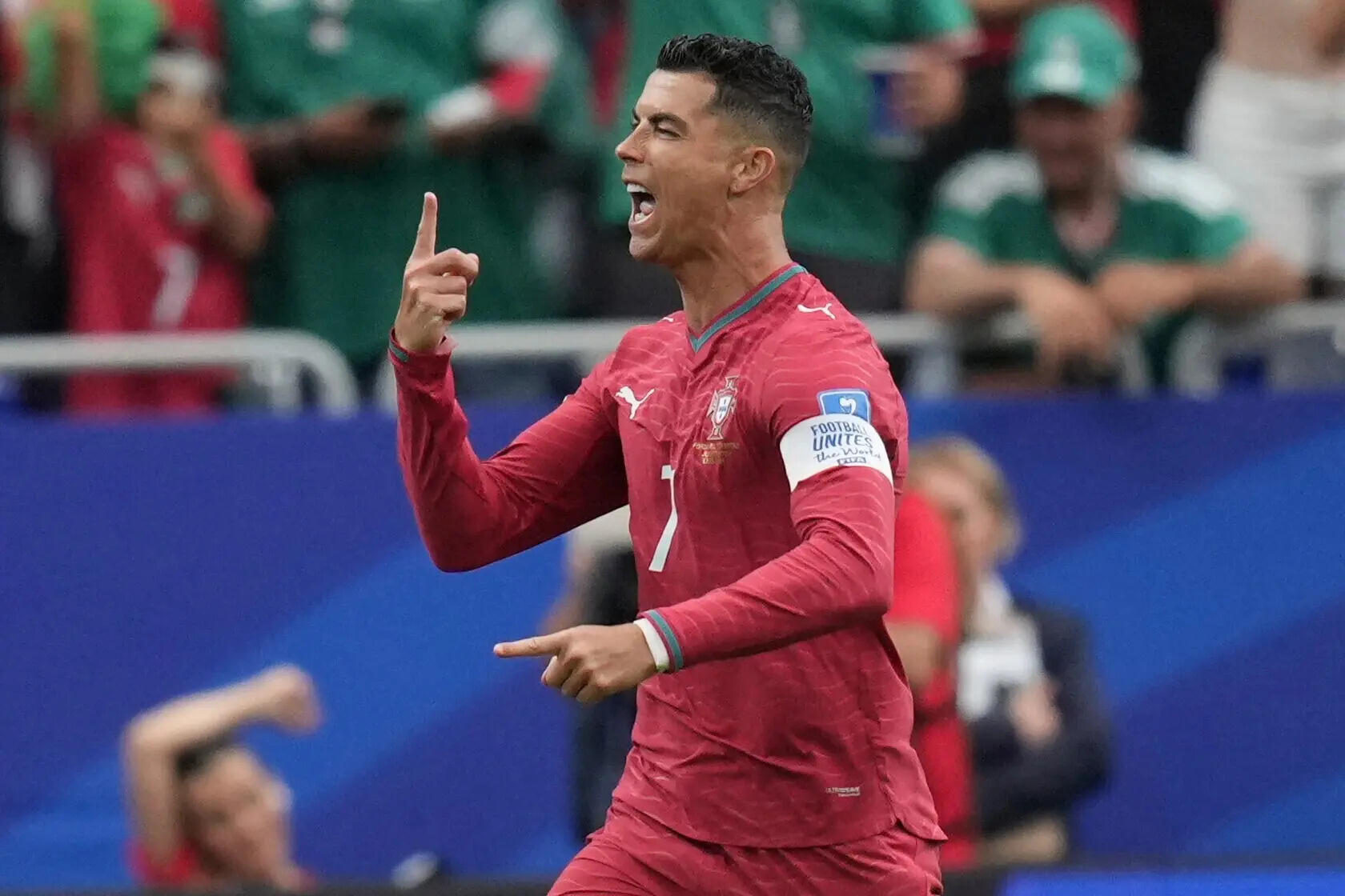 Portugal's Ronaldo and England's Kane are the focus of World Cup day 13, among other highlights in photos