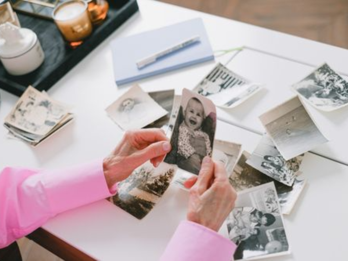 The person in the photograph is still part of the same life story, but the circumstances surrounding that version of the self may no longer exist