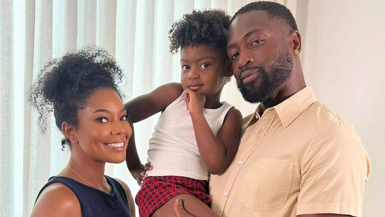 Kaavia Wade with Dwyane Wade and Gabrielle Union