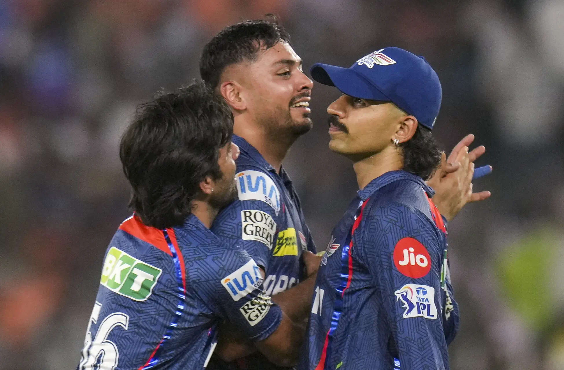 Ahmedabad: LSG's Avesh Khan with teammates celebrates the wicket of GJ's Shahruk...