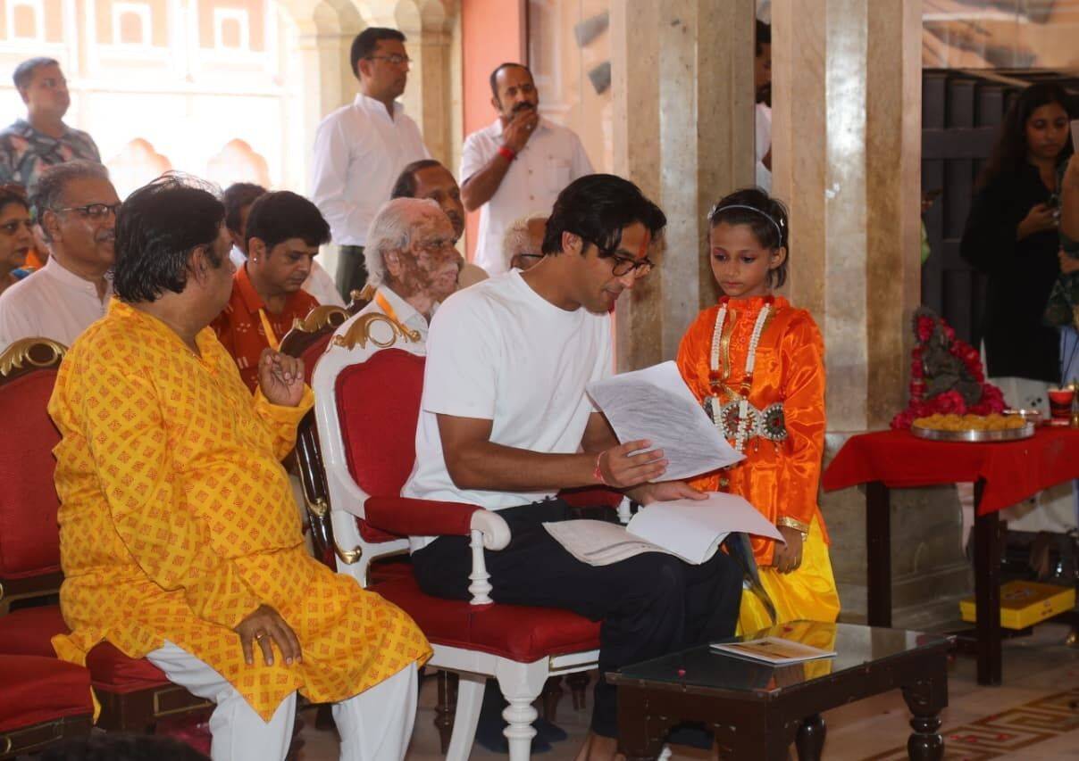 Little girl showing her painting to erstwhile royal Lakshraj Prakash of Sirmour