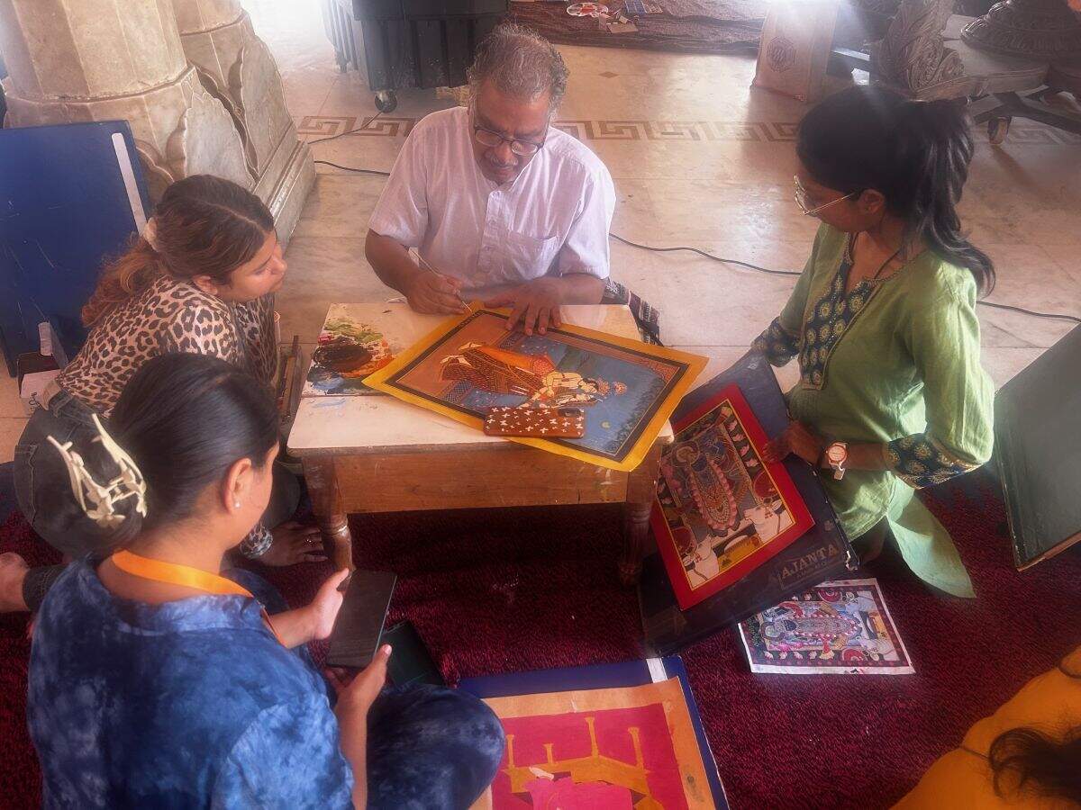 Artish Lakshami Narayan Kumawat teaching miniature art