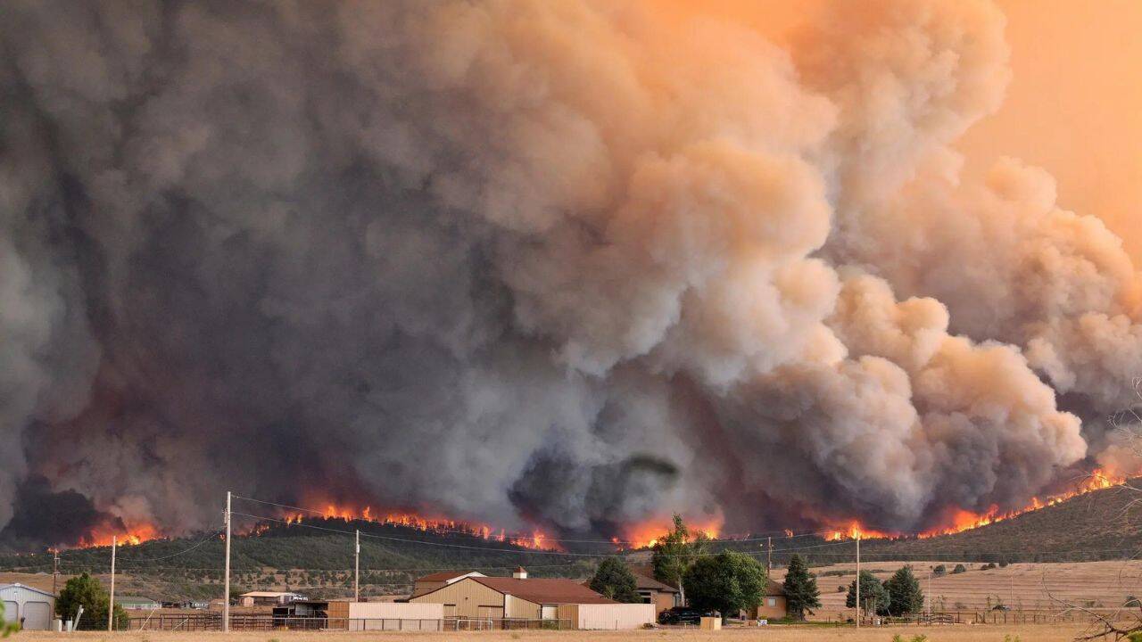 Massive Colorado wildfire forces thousands to flee homes